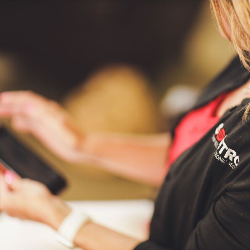 Sonitrol Employee on her phone