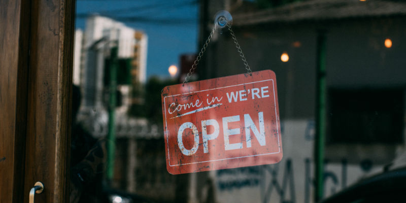 Open sign on a business door