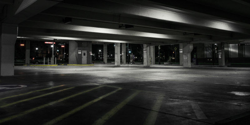 A closed parking lot at night