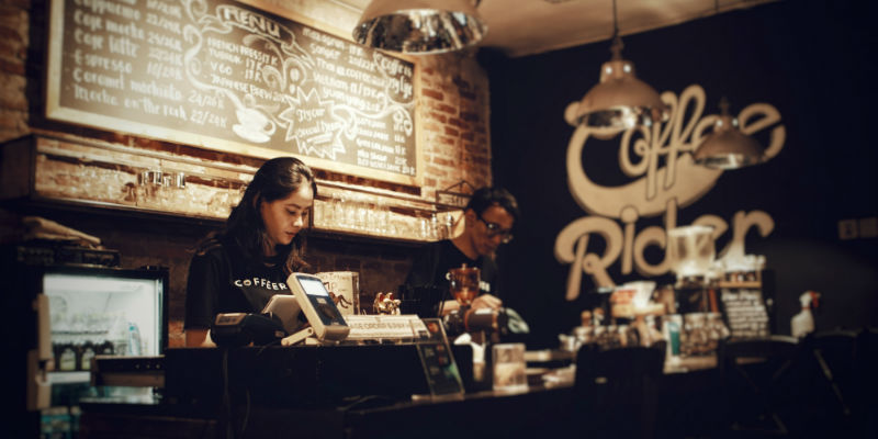 Employees working in a coffee shop