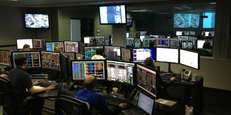 Team of experts remotely monitoring a security solution