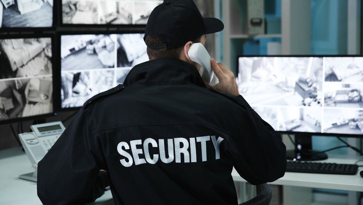 Security guard on the phone