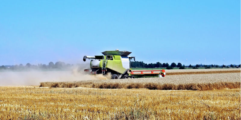 A farmer at work in tractor