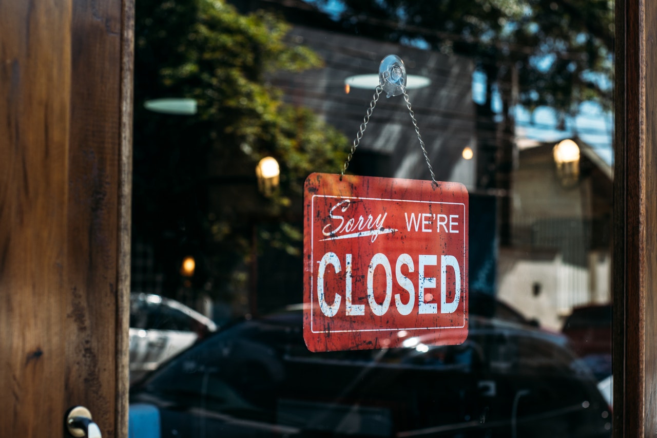 Business displaying closed sign